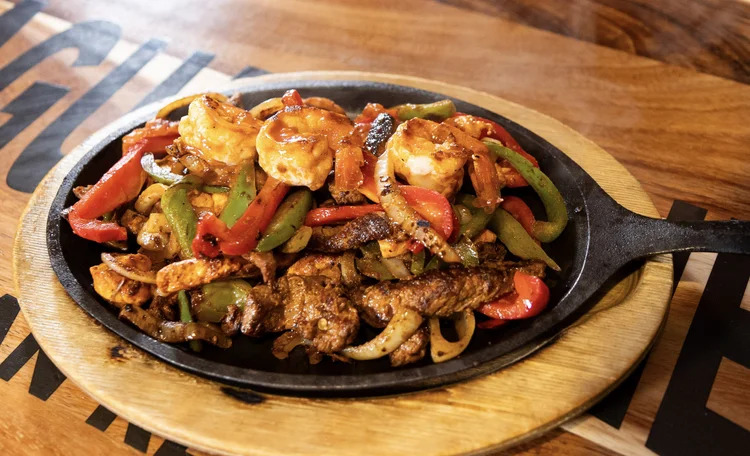 Sizzling mixed fajitas