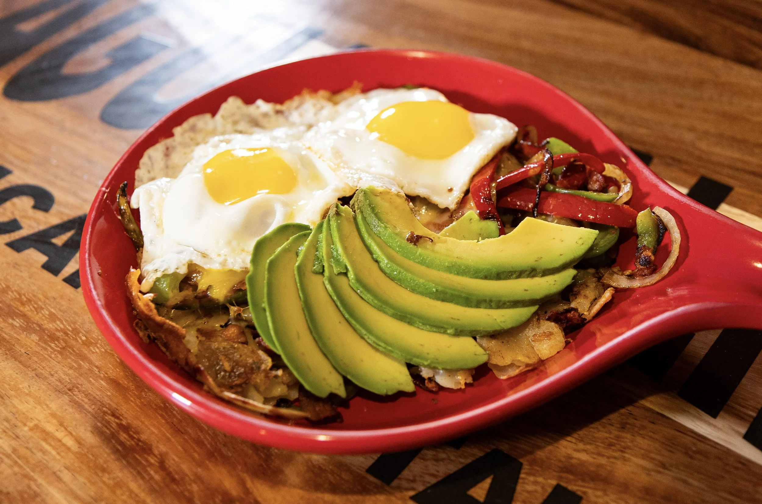 Huevos, avocado and grilled peppers